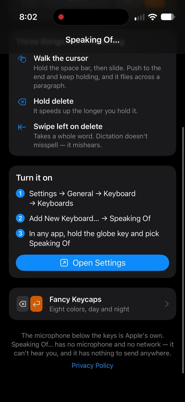 The Speaking Of app: Turn it on, with three steps and an Open Settings button, the Fancy Keycaps door, and a note that the microphone below the keys is Apple's own.